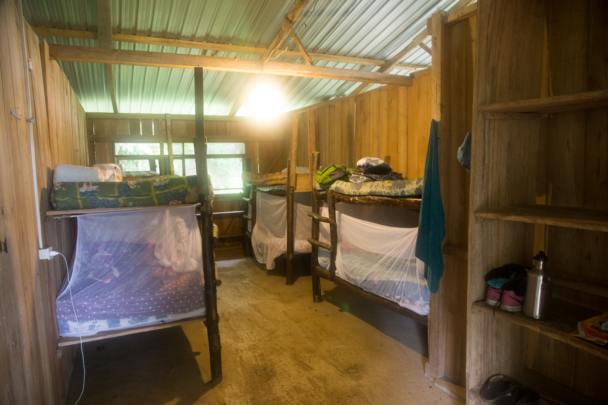  Our bedtime oases. Everyone had a full bunk: luggage stayed on the top bunk (so critters wouldn't get in) and mosquito net caves were constructed on the bottom bunks (so critters wouldn't get in). 
