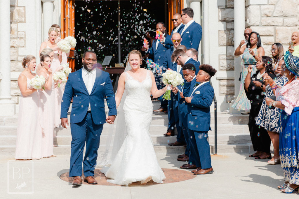 bubble exit from interracial couple's wedding ceremony