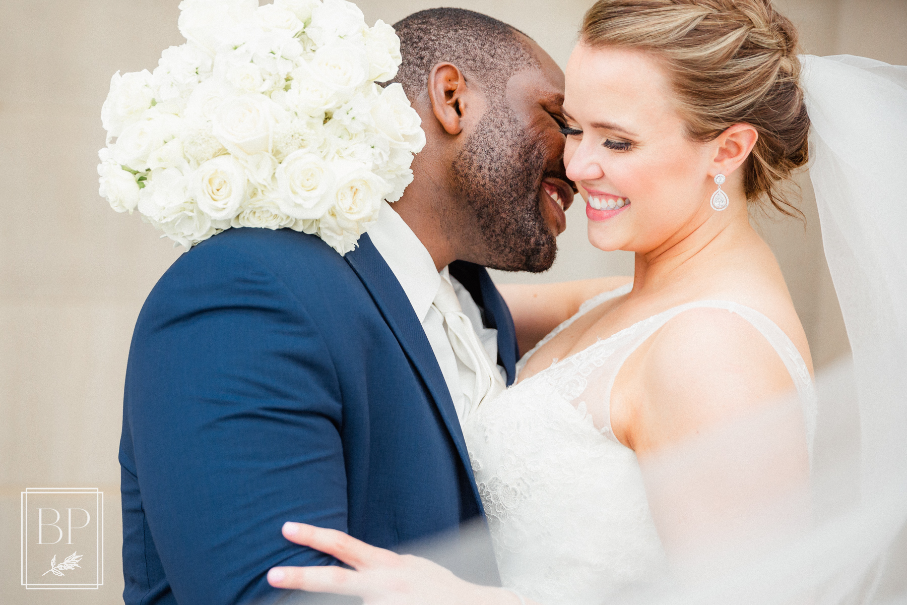 interracial couple portrait on their wedding day