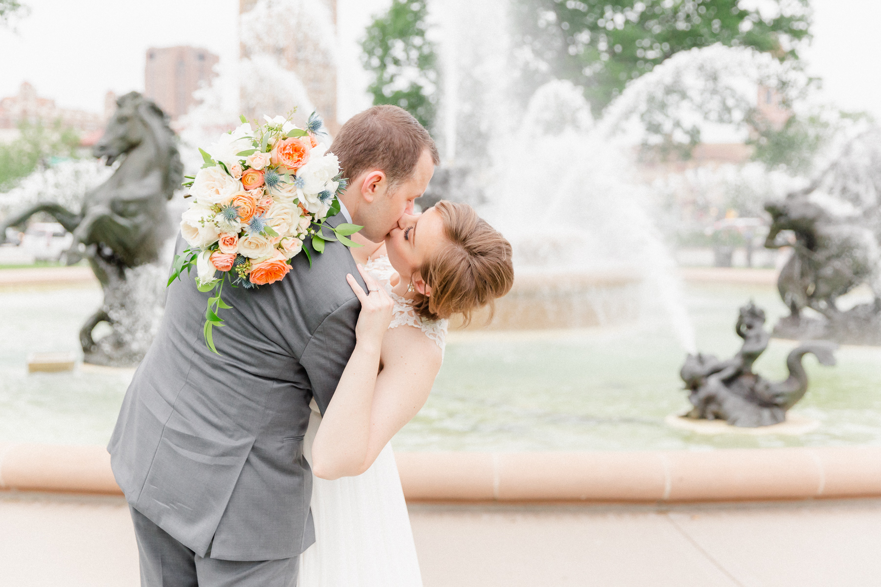 intimate spring peach, navy & green backyard wedding with BHLDN gown
