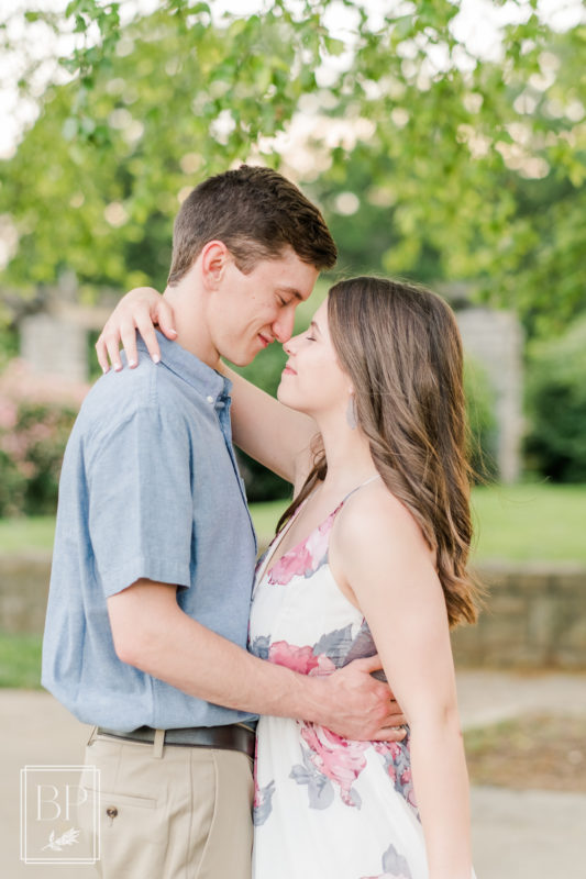 Spring white, pink, and blue Loose Park Engagement Session Kansas City Wedding Photographer