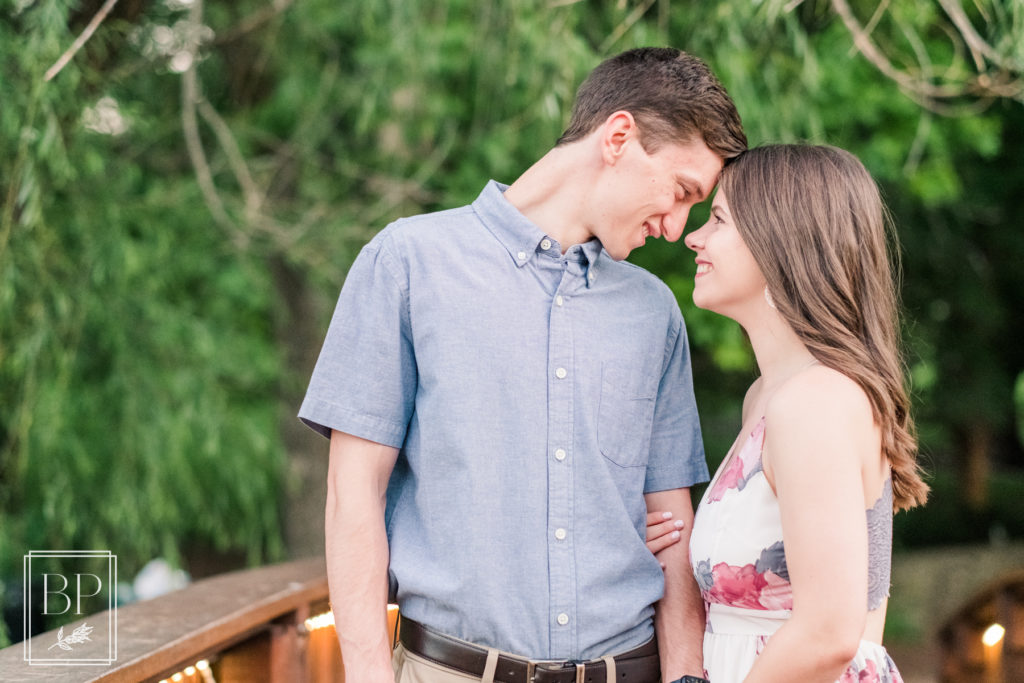 Spring white, pink, and blue Loose Park Engagement Session Kansas City Wedding Photographer