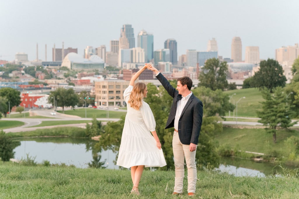 blue and white summer sunset engagement session at the scout kansas city